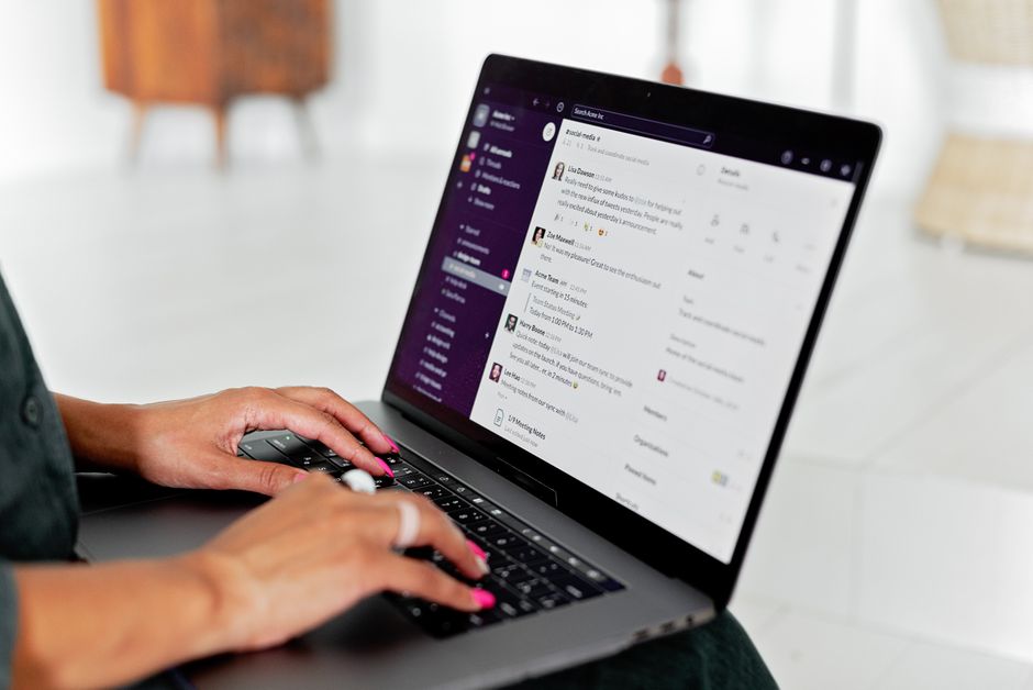 Person typing on a laptop, representing testing and refining AI prompts
