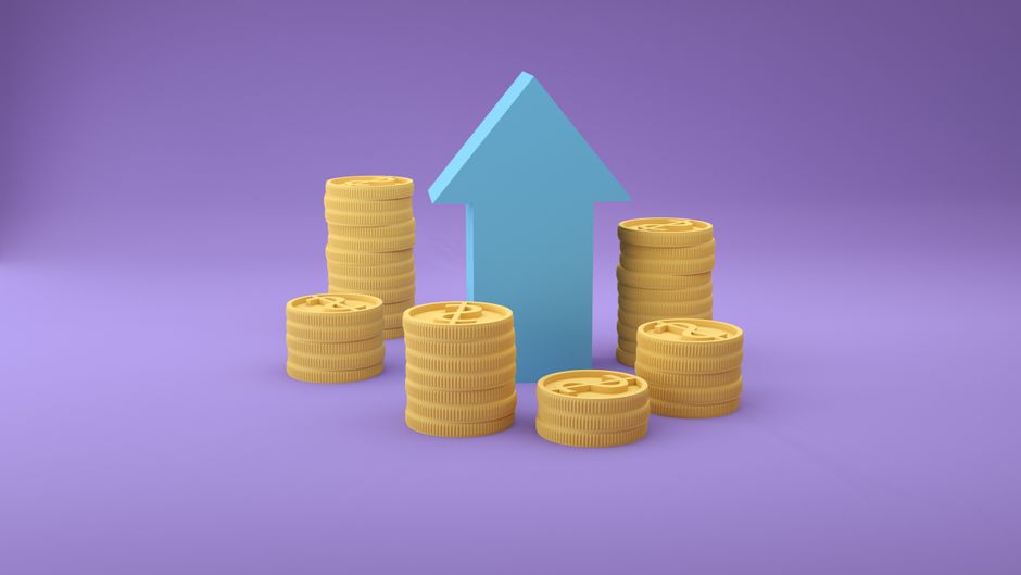 Stacks of coins growing in height, representing raising a digital product's price